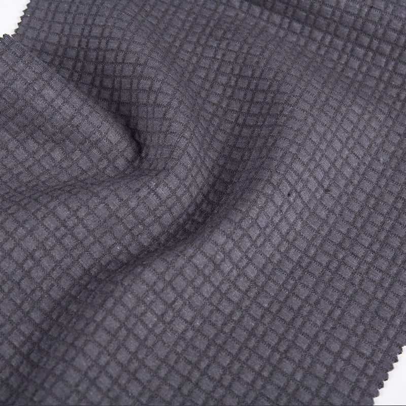 Dombornyomott kockás gyémánt kötött jacquard poliészter gyapjú pamut modális sportruházati szövetek ruházathoz AW23007